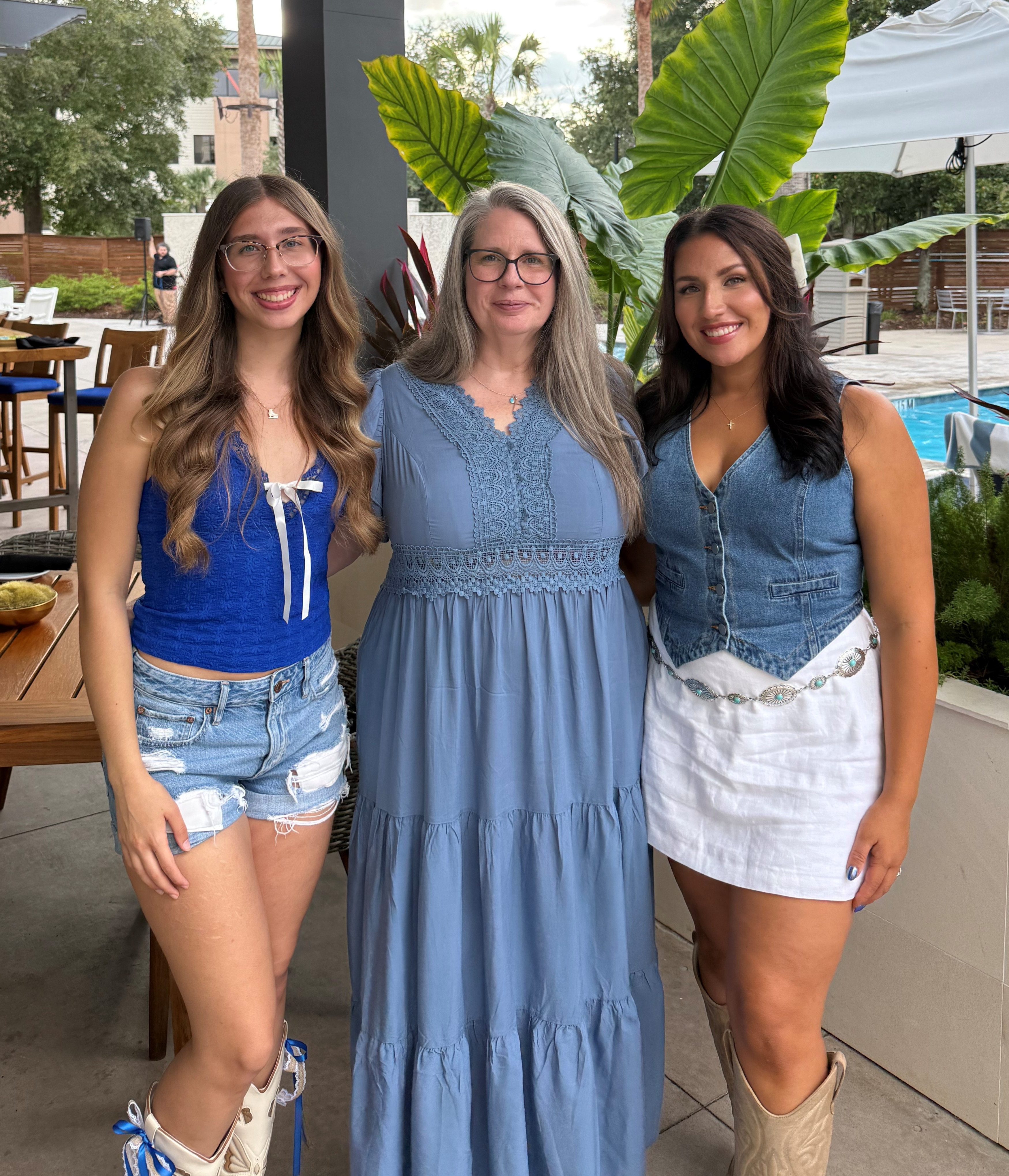Cheryl Bolton, center, stands with her daughters
